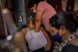 pulitzer prize award photography danish adnan amit sanna covid india reuters