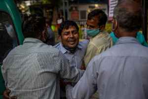 pulitzer prize award photography danish adnan amit sanna covid india reuters