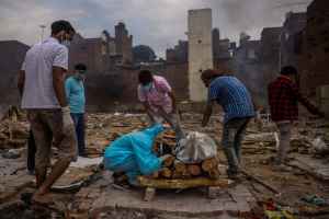 pulitzer prize award photography danish adnan amit sanna covid india reuters