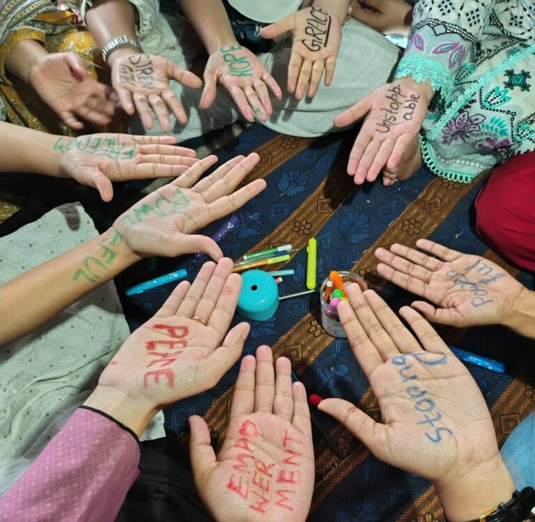 Hope, Freedom, Courage: Women Mark International Women’s Day with a Powerful Palm Protest